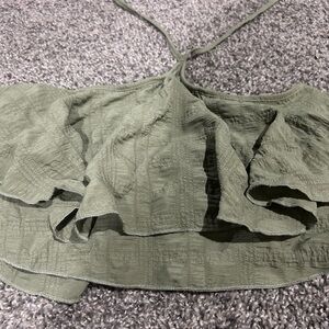 Green Tube top shirt with tie over neck.